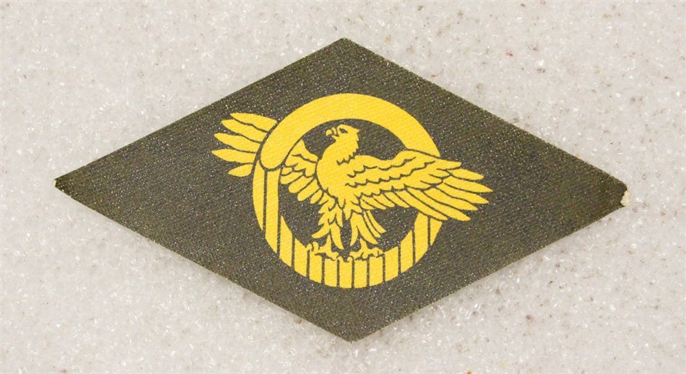 Cloth Army Badge 073: WWII Discharge Diamond, Ruptured Duck - printed on OD