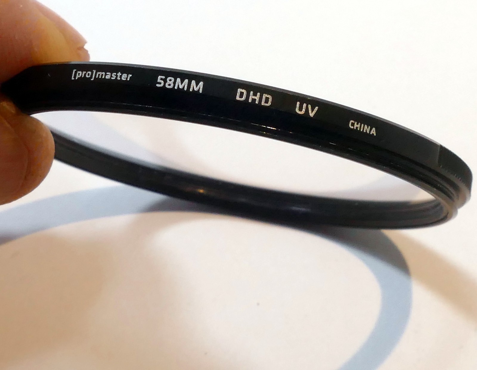 Promaster  DHD 58mm UV Filter Protector lens with ribbed rim