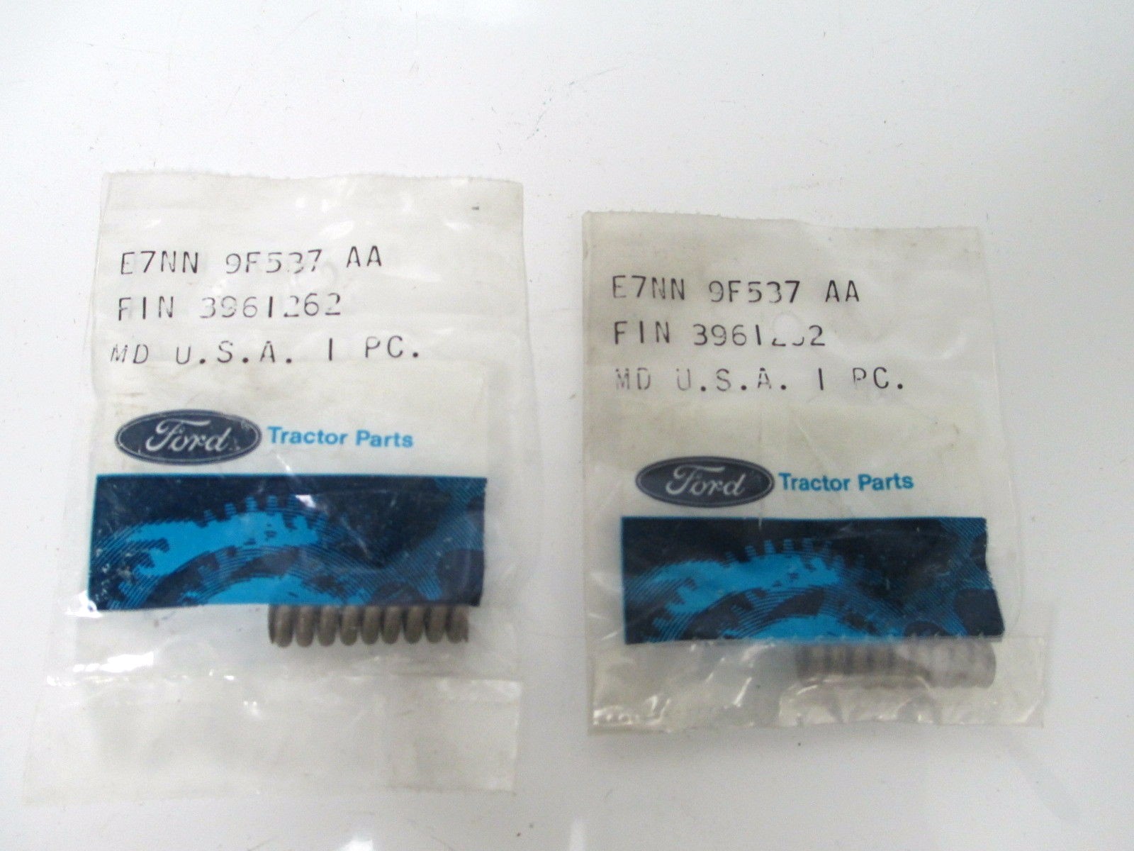 FORD SPRING 2 PACK E7NN9F537AA OEM NEW IN PACKAGE TRACTOR BACKHOE