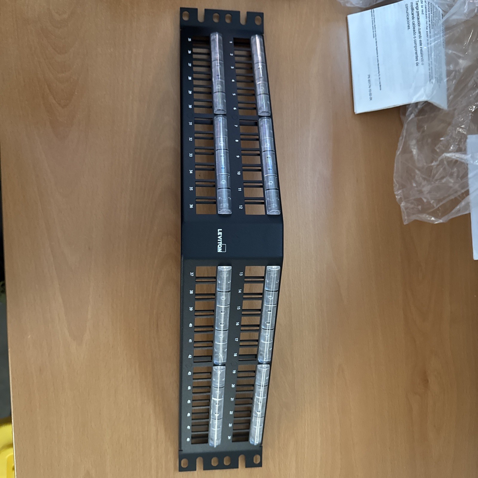 Leviton 49256-L48 2RU 48‑Port Angled Quickport Patch Panel Black w/Label Window
