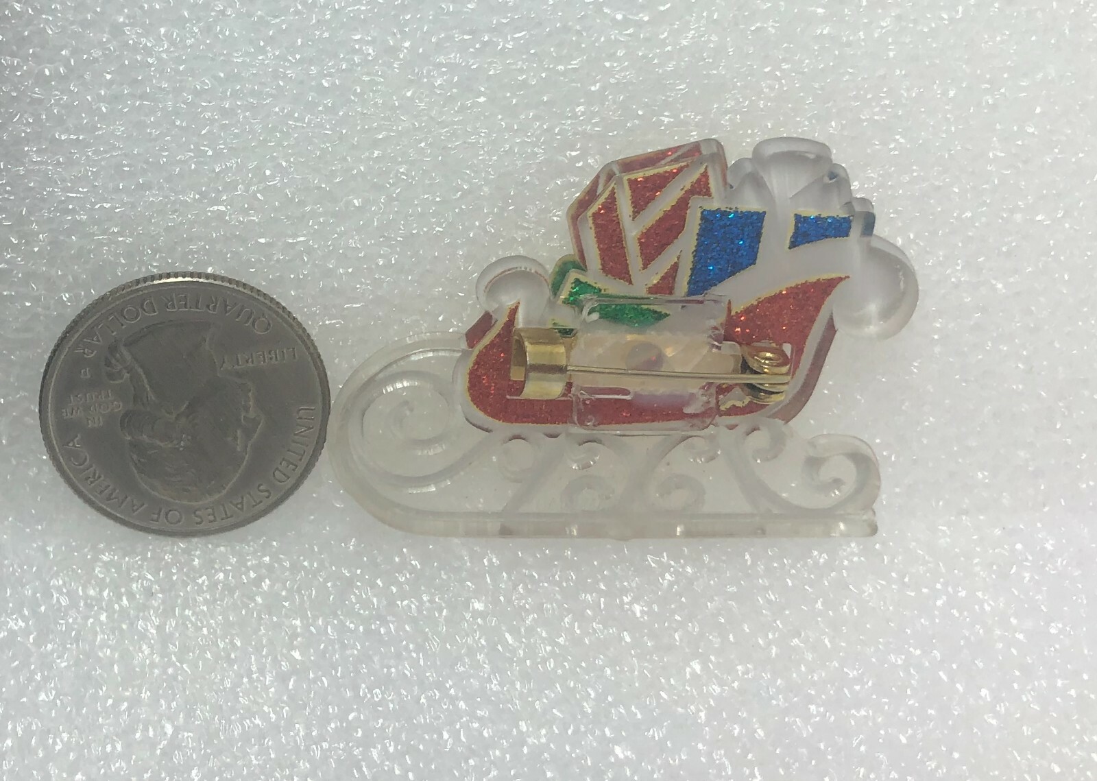 Sleigh w/ Christmas Presents Plastic Pin