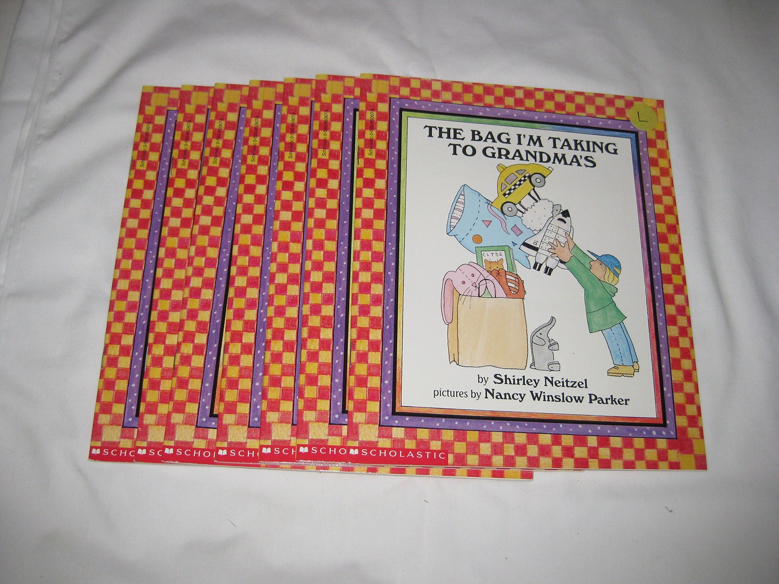 The Bag I'm Taking to Grandma's: A Picture Book with Rebuses About Packing Toys