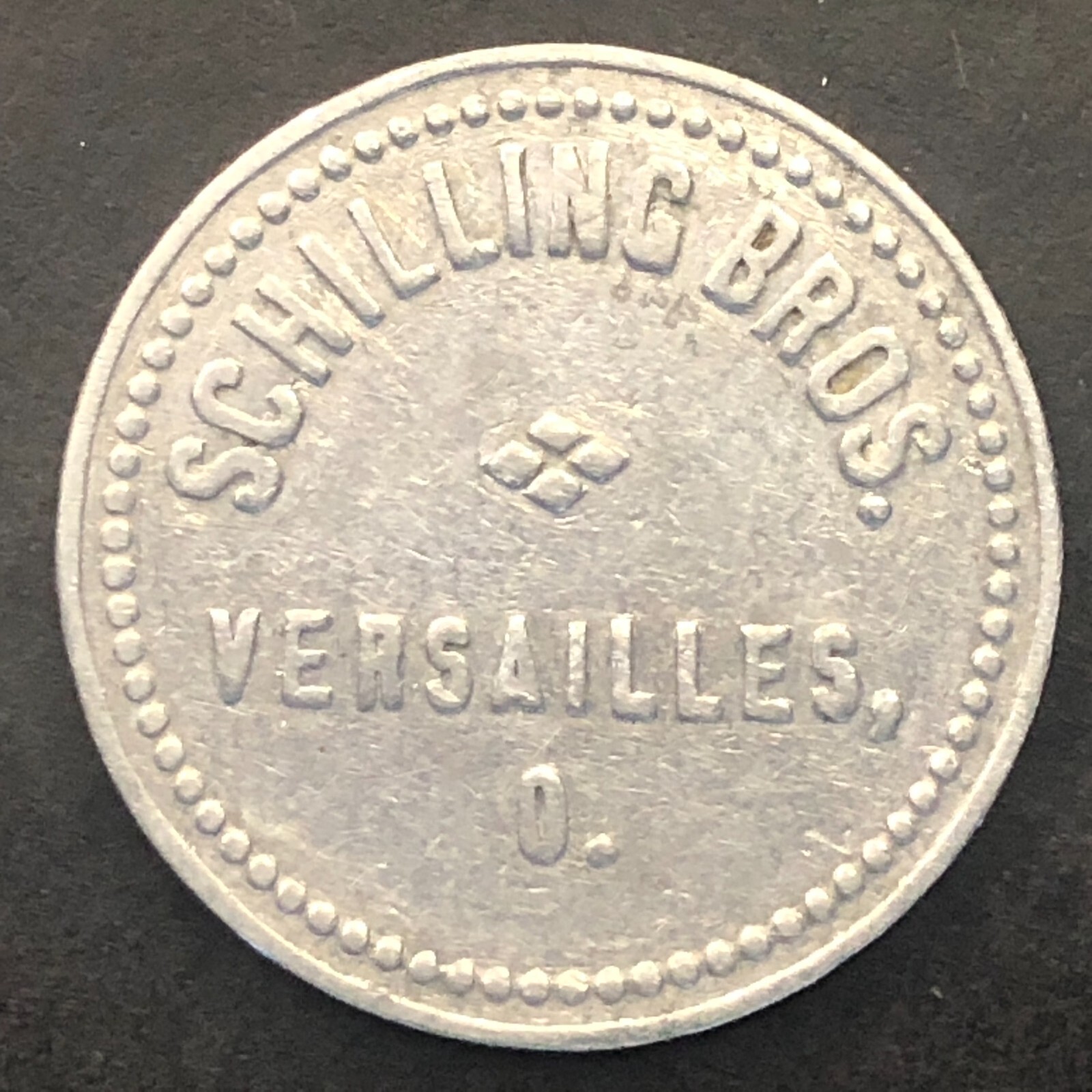 Versailles, OH Schilling Bros. (Cafeteria) G/F 5¢ Trade Token Alum. 24.6mm