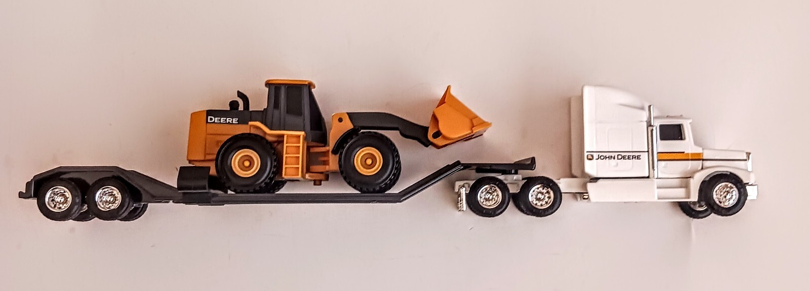 ERTL JOHN DEERE SEMITRUCK WITH JOHN DEERE FRONT END LOADER