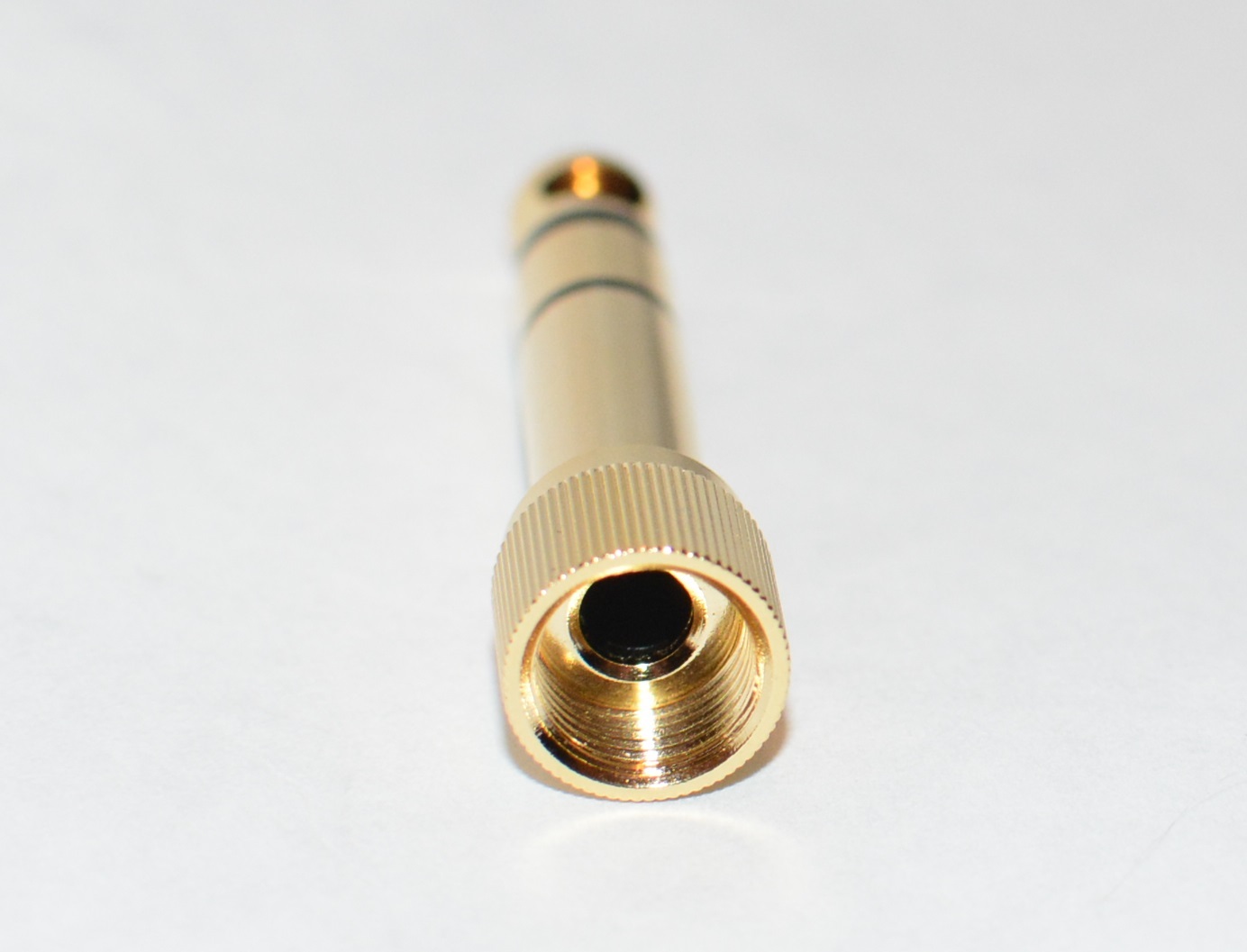 Locking 1/8" - 1/4" screw-on headphone adapter for Sony