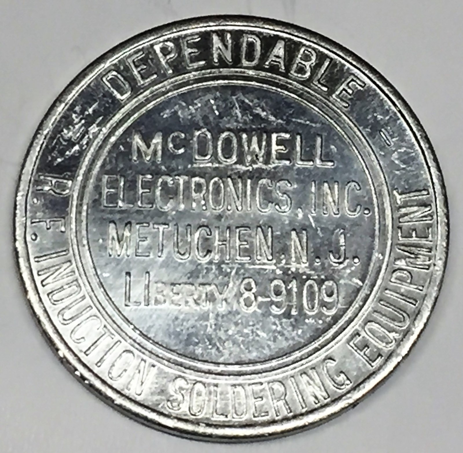 # C5245      METUCHEN,  N.J.  ALUMINUM   TOKEN,     McDOWELL ELECTRONICS  CO.