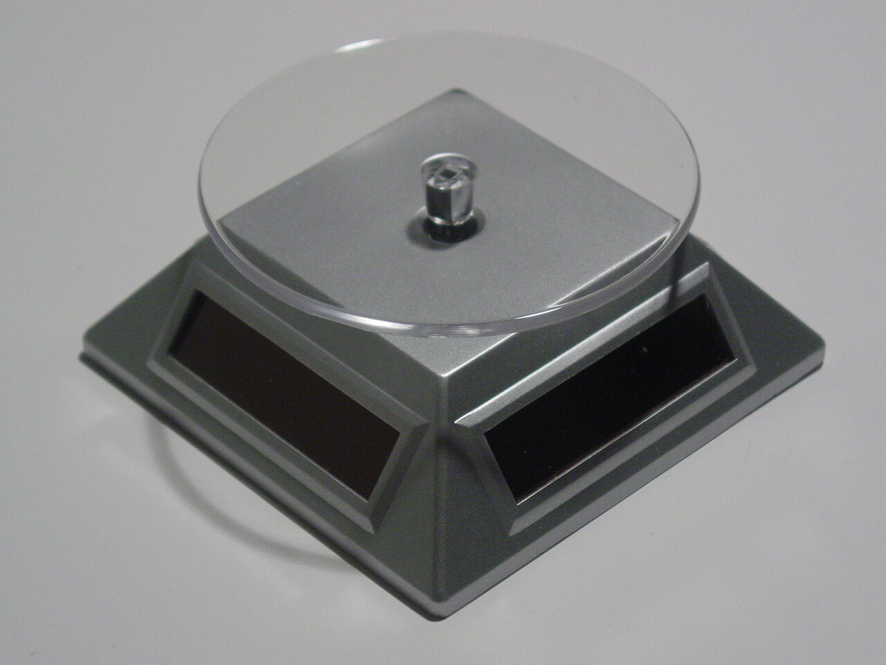 **REDUCED** SOLAR POWERED ROTATING DISPLAY BASE - silver