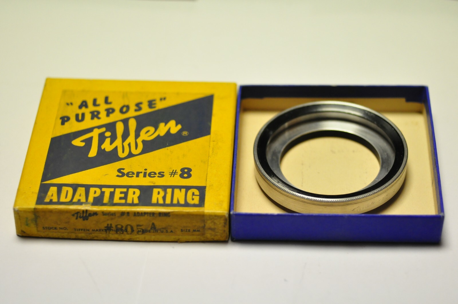Tiffen 805A series VIII adapter ring in box.
