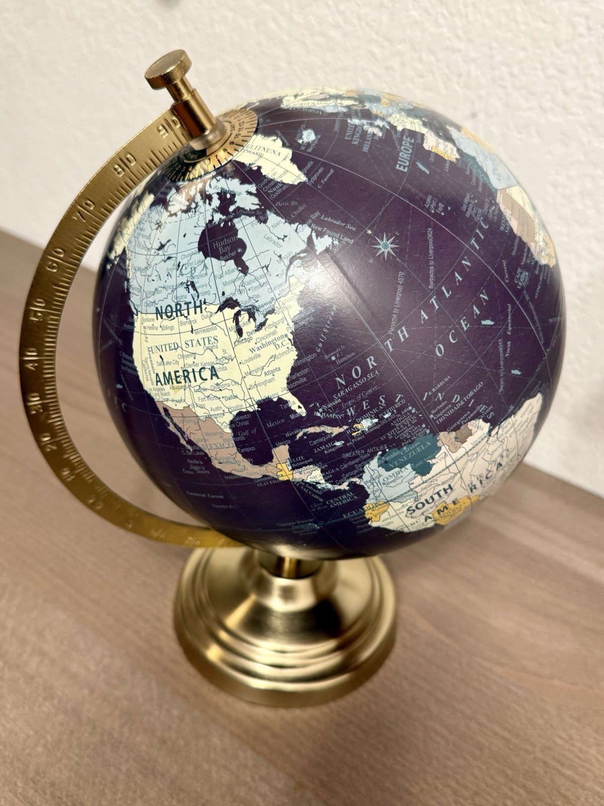 Designco Decorative Tabletop Globe Rotating World Globe Brass Tone Base