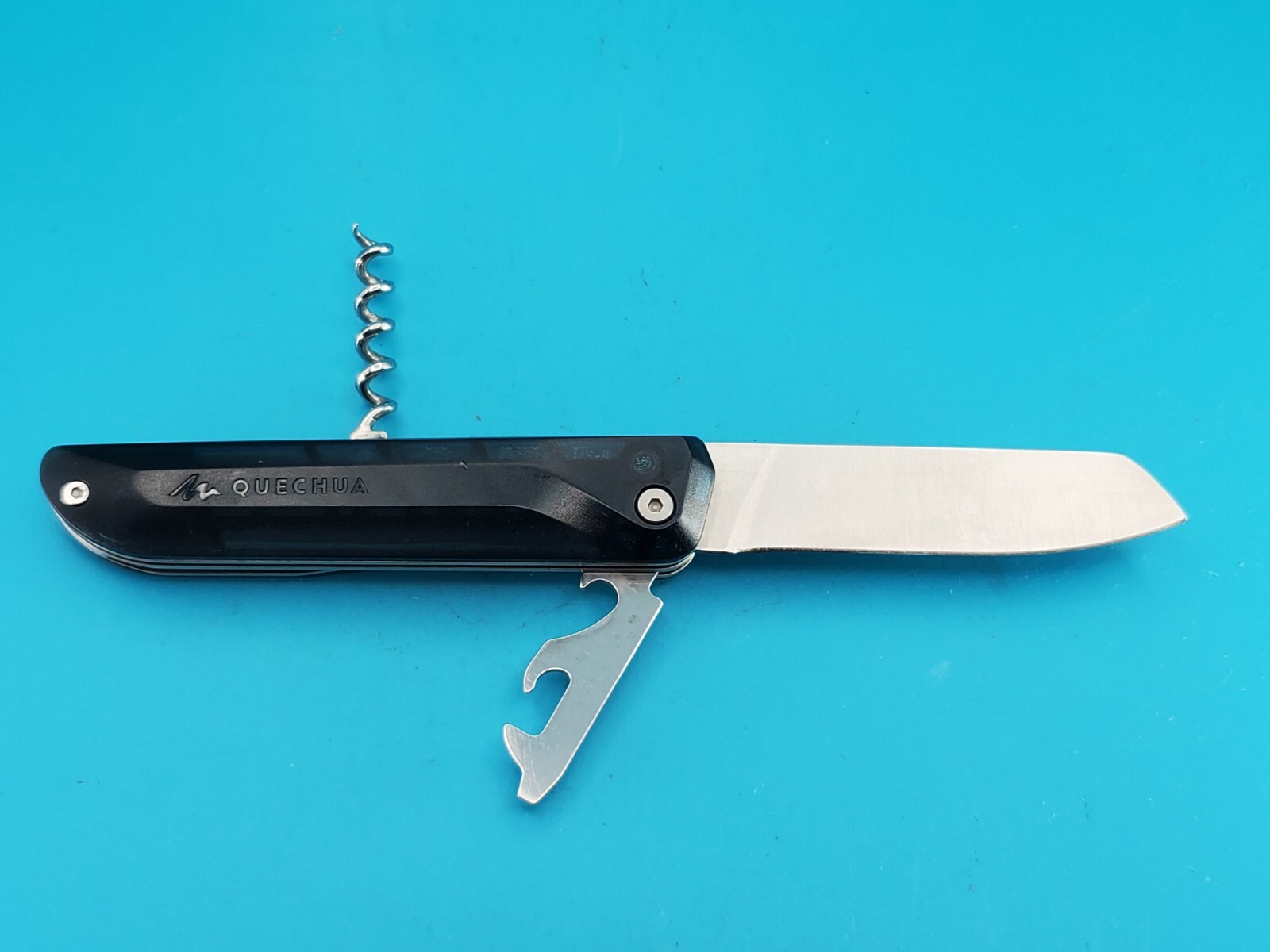 QUECHUA CLAP FOLDING KNIFE NAVAJA MULTITOOL! TRANSLUCENT BLUE!