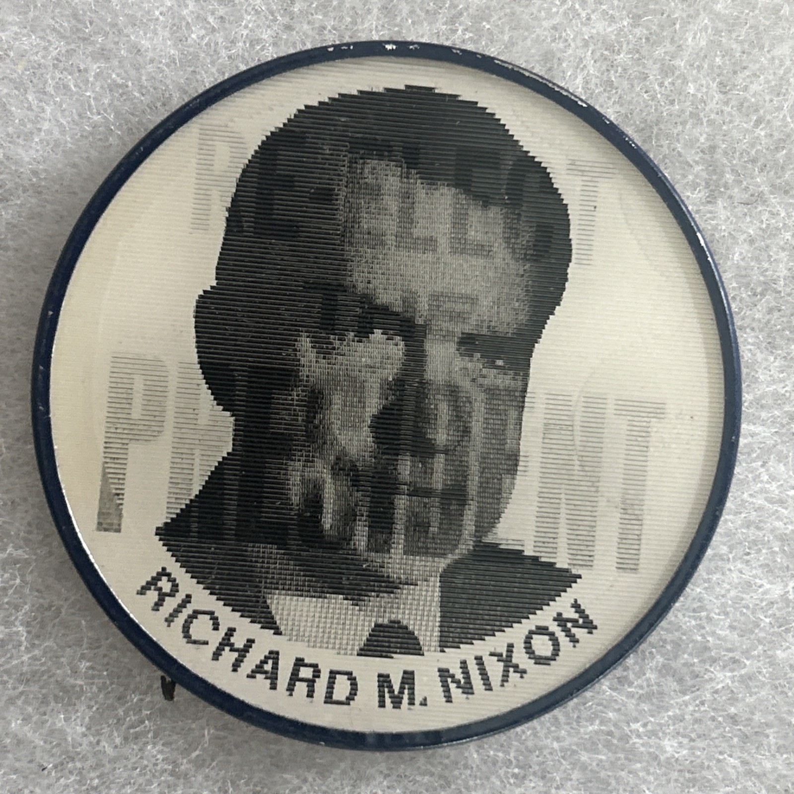 Richard M. Nixon / Re-elect The President flasher  2 1/2” pinback