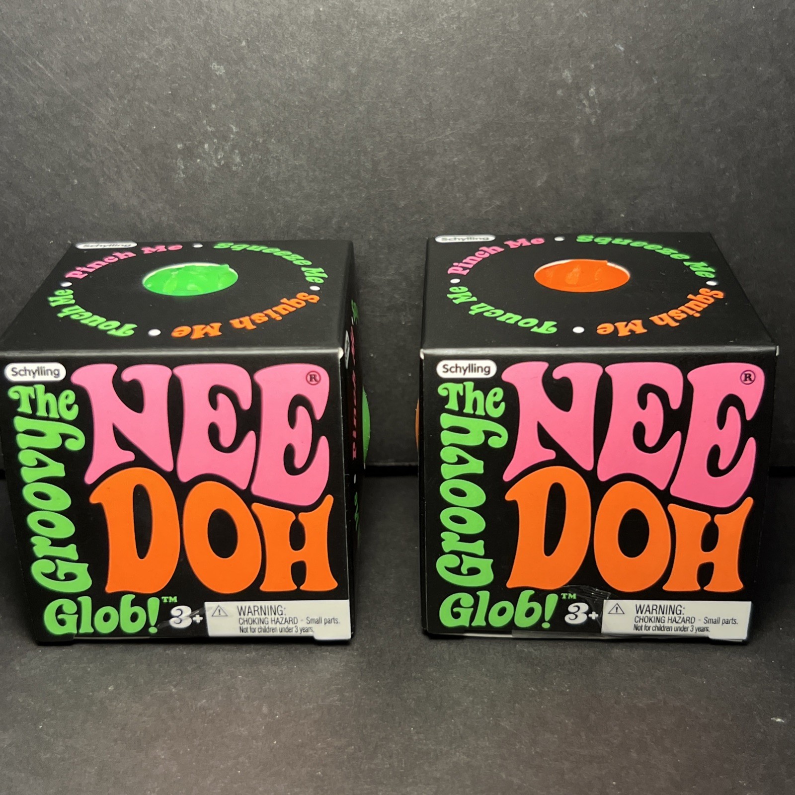 Lot Of 2 Nee Doh The Groovy Glob Stress Ball Green & Orange
