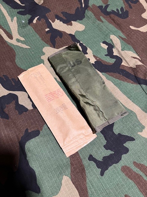 Vietnam era small arms cleaning kit, with pouch