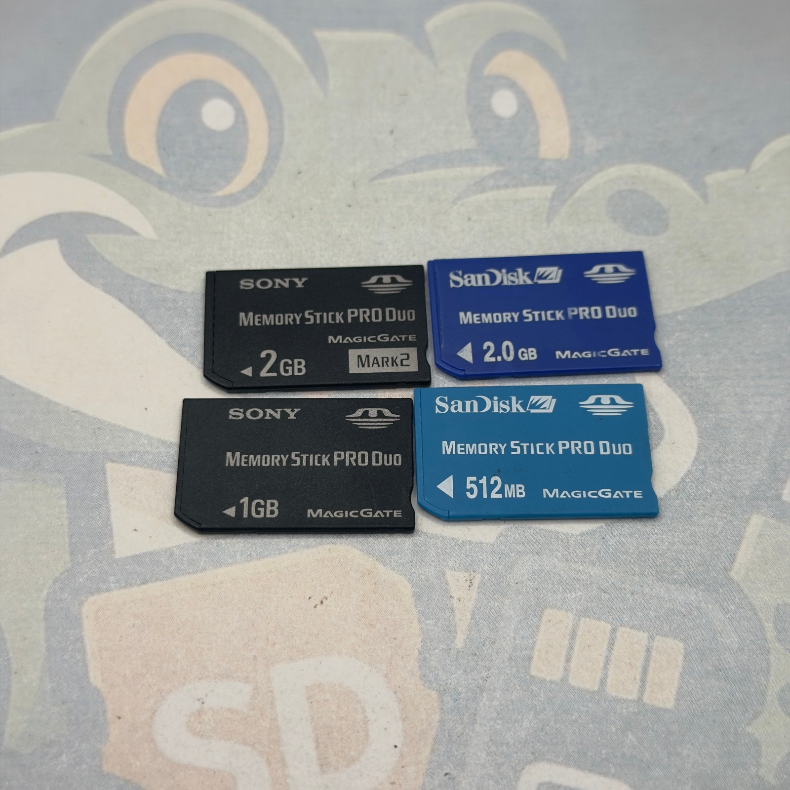 LOT of 4 MemoryStickDUO Cards - Various Sizes - Untested - Various Brands- GC945