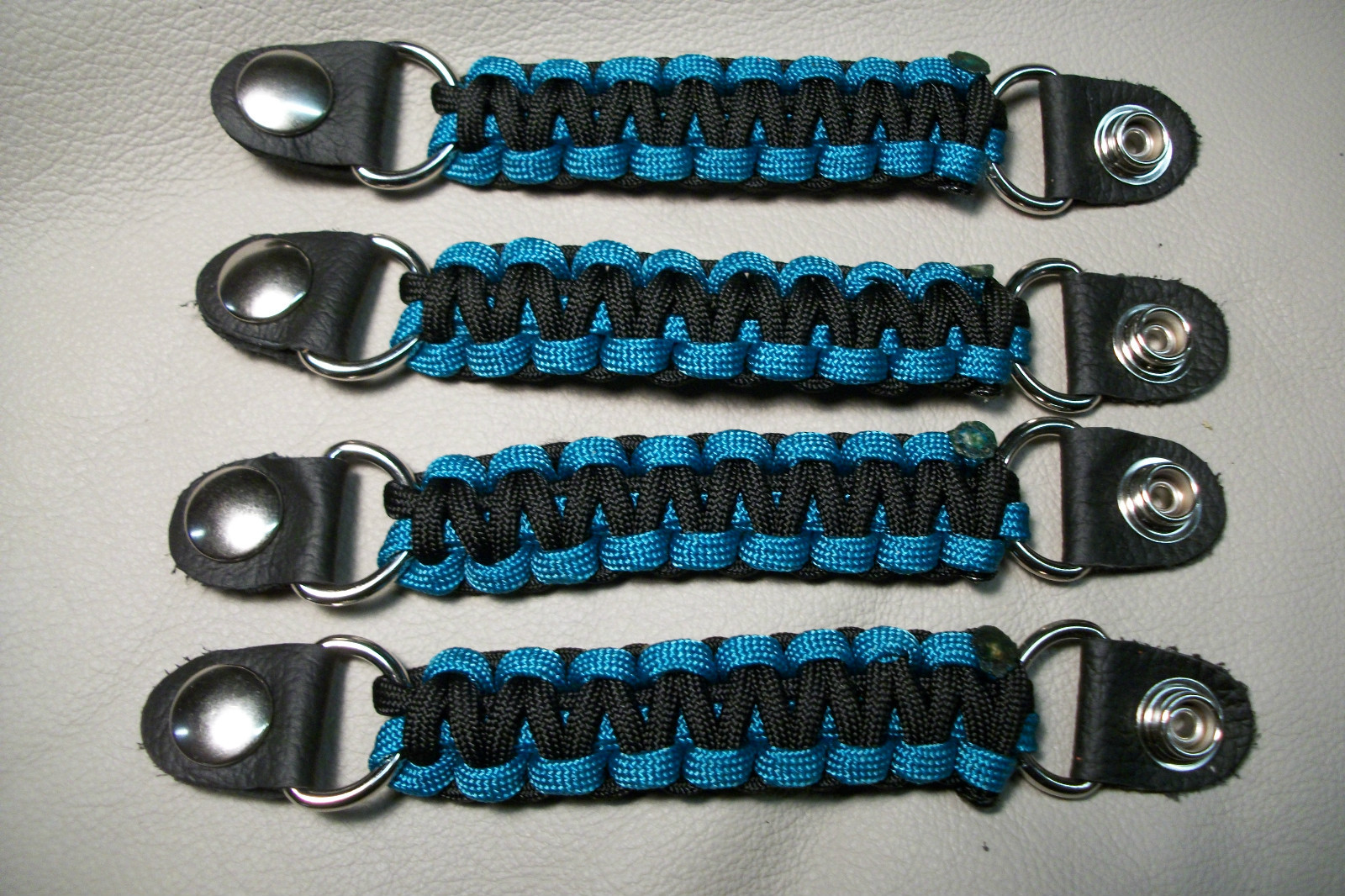 Vest extenders Turquoise and black para cord lightweight but STRONG!! By Stitch