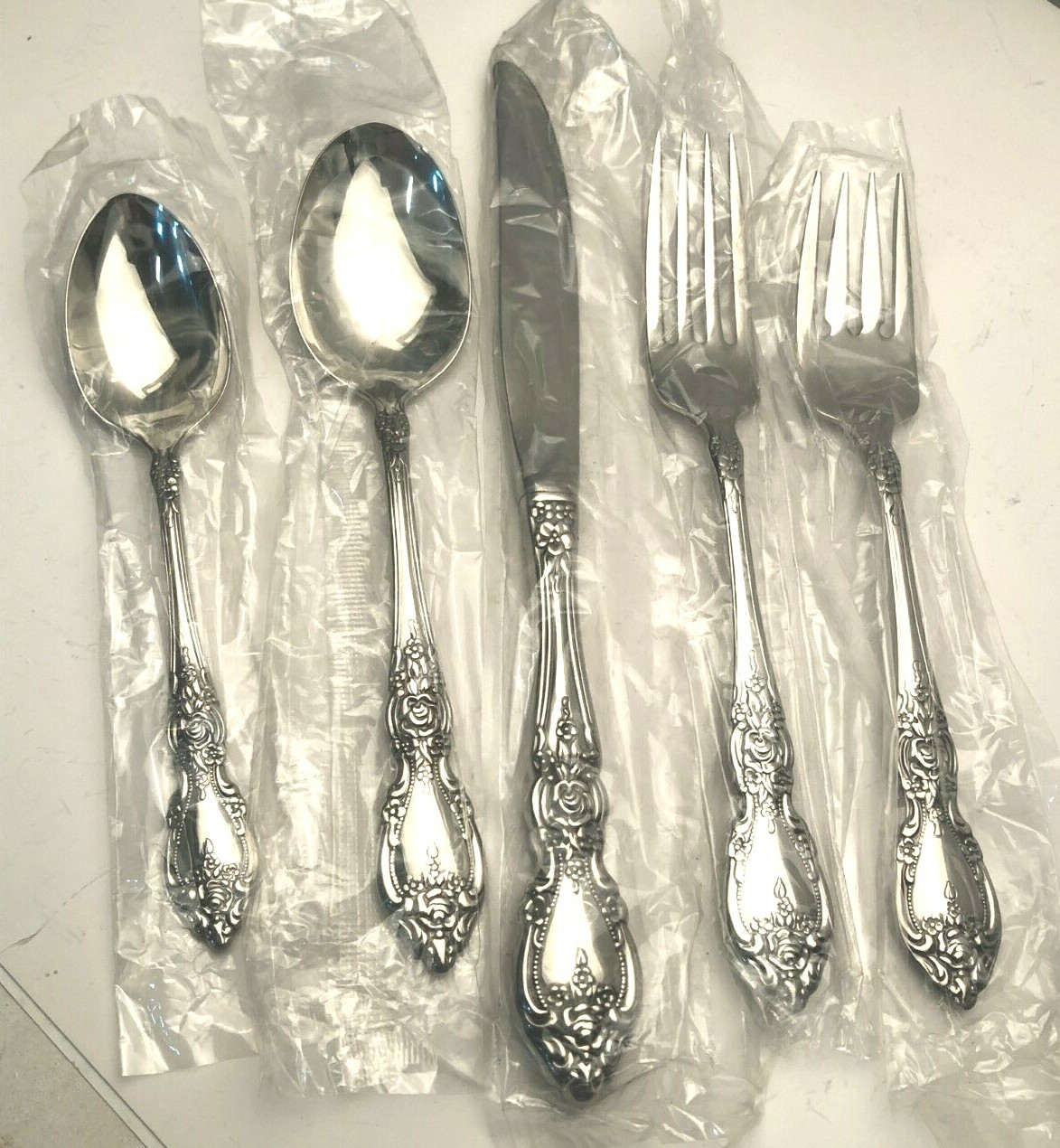Wordsworth by Oneida 5 piece Place Setting stainless flatware, new in wrappers