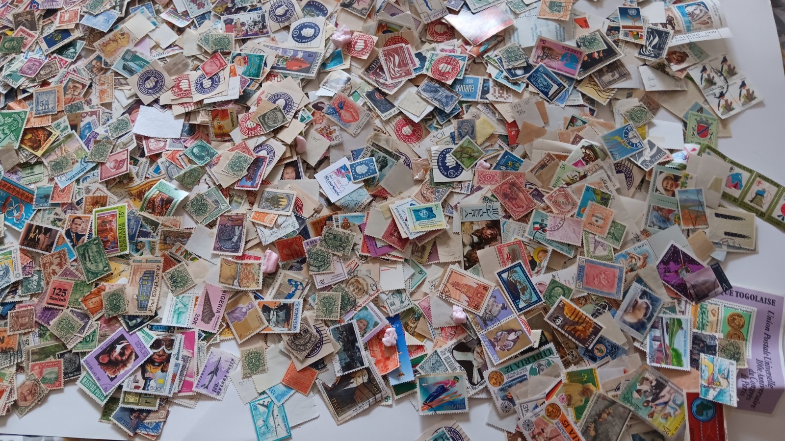 GRAND  OPENING SALE!  600 Old worldwide postage stamps for sale(extras added)