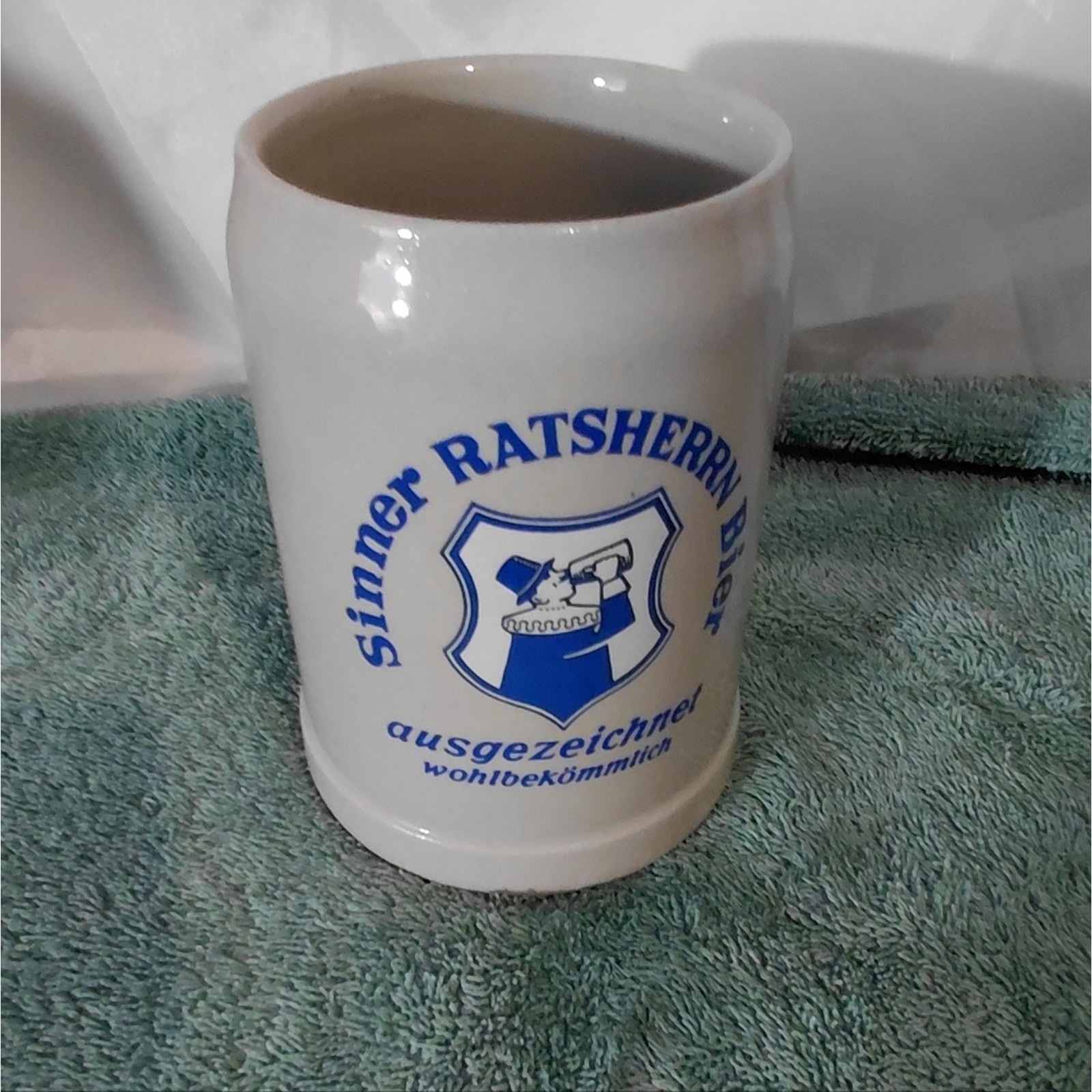 White Ceramic Beer Stein with Blue Crest