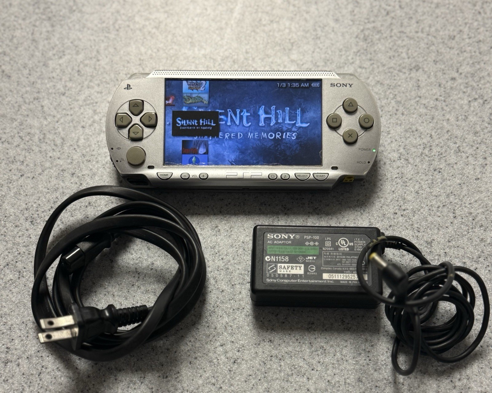 Sony PSP-1000 Silver Handheld Console with Charger- 1000+ Game Library