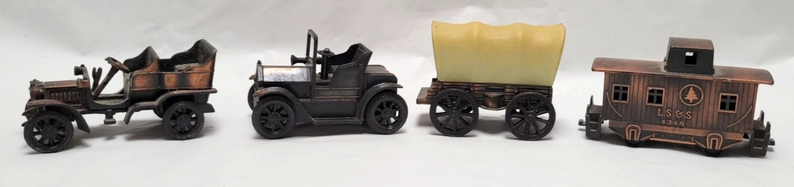 Vintage Lot of 4 Metal Copper Bronze Pencil Sharpeners Train Cars Covered Wagon