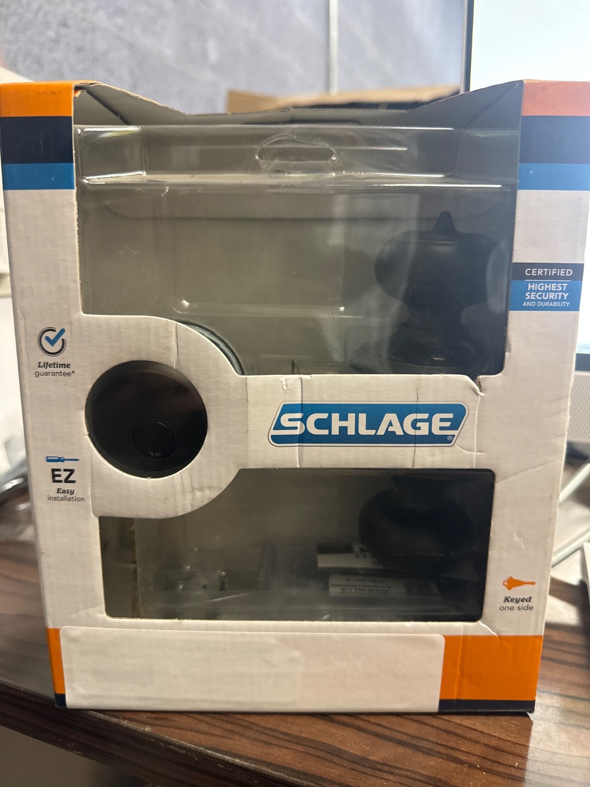 Schlage Georgian Aged Bronze Deadbolt and Entry Door Knob 1-3/4 in.