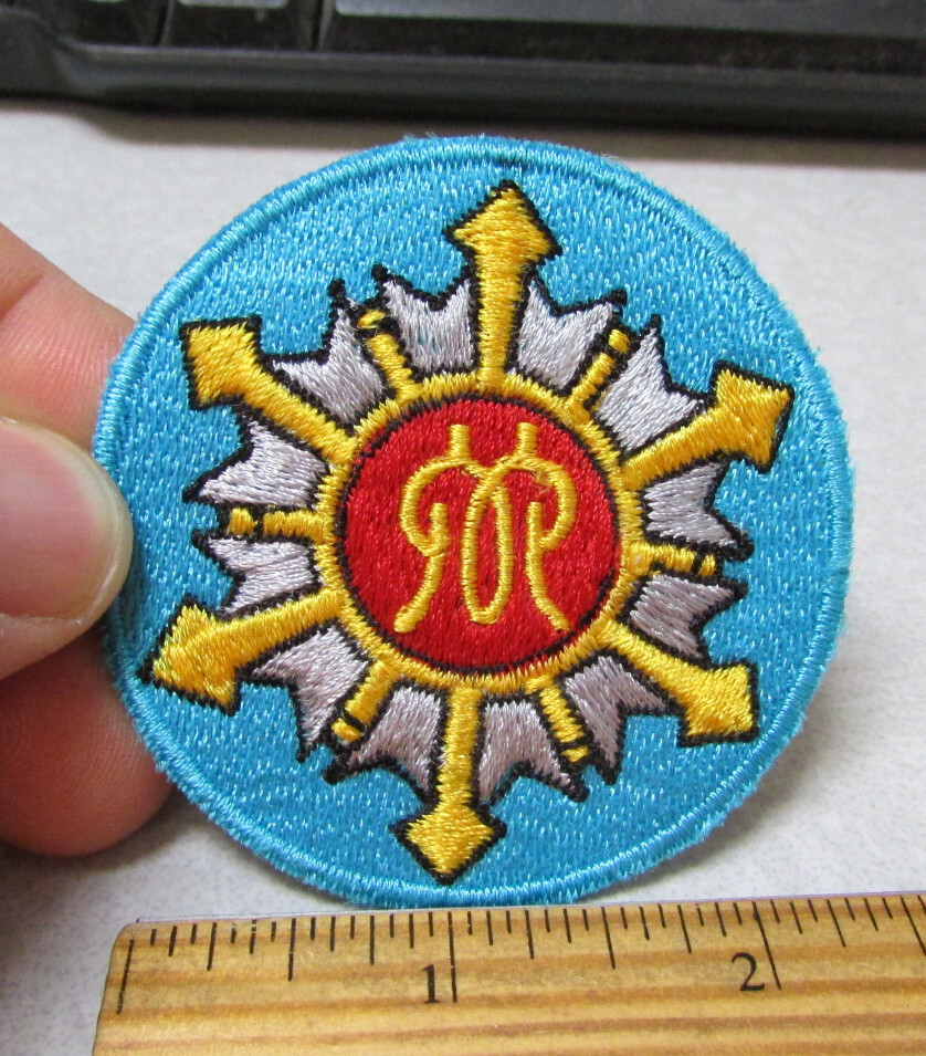 unusual Compass style log on a sew on style Embroidered Patch, unused