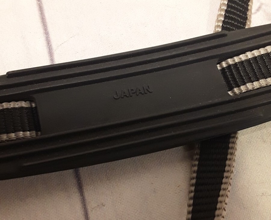 Canon E57 video camera Lens Cap 49mm & Shoulder Strap