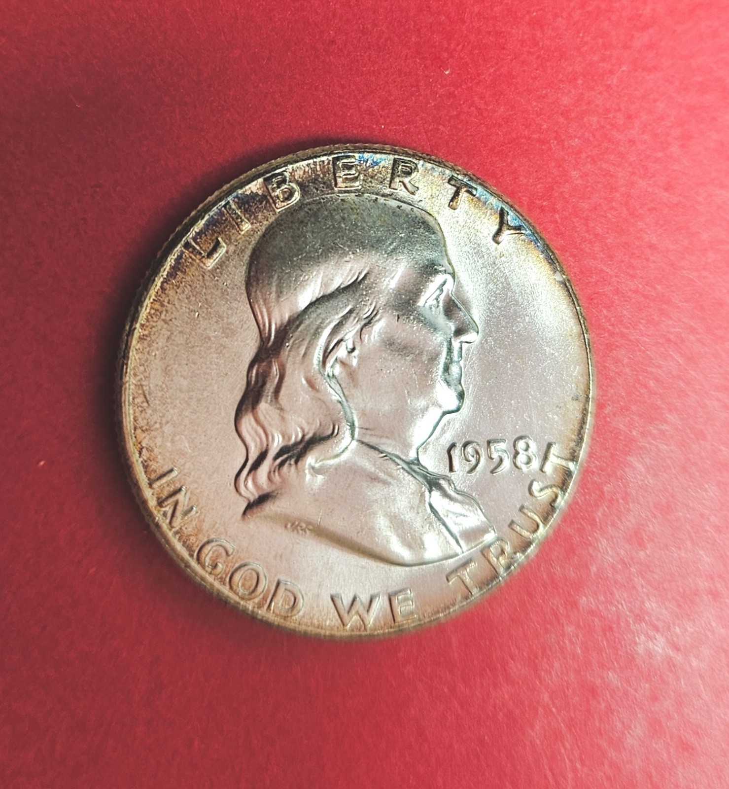 1958  Franklin Silver Half Dollar.  Uncirculated. Toned.