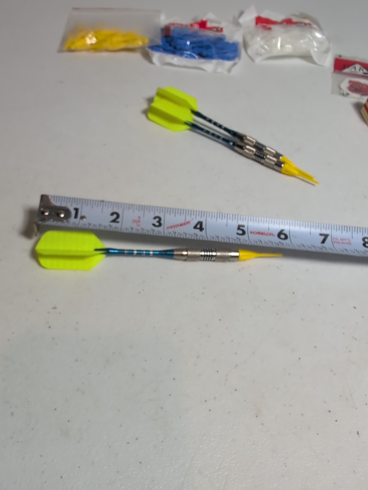 9 soft tip darts Unknown Manufacturer/ 60 Extra Tips 2 Sets Xtra Fletching