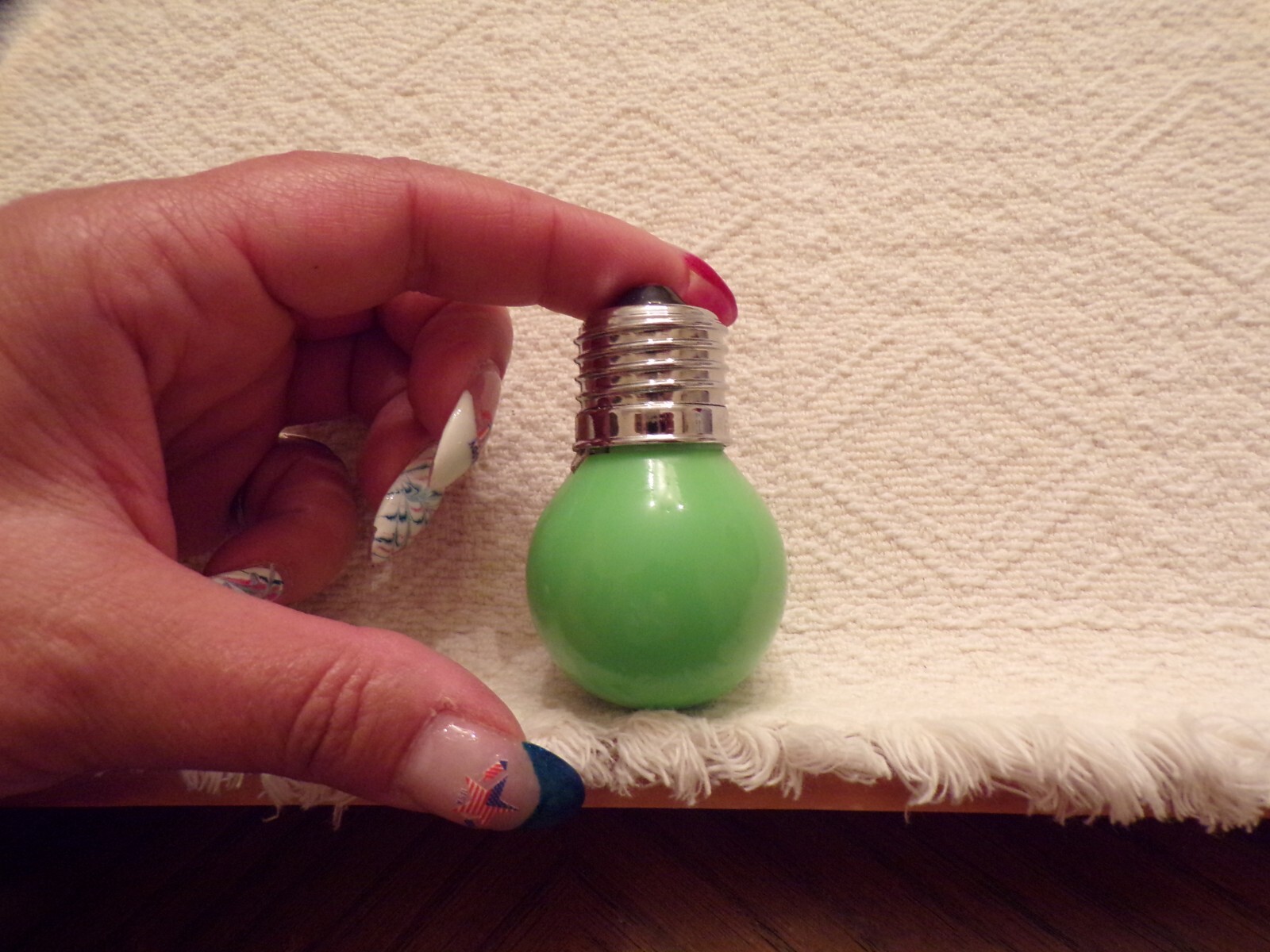 Lighter Green Light Bulb