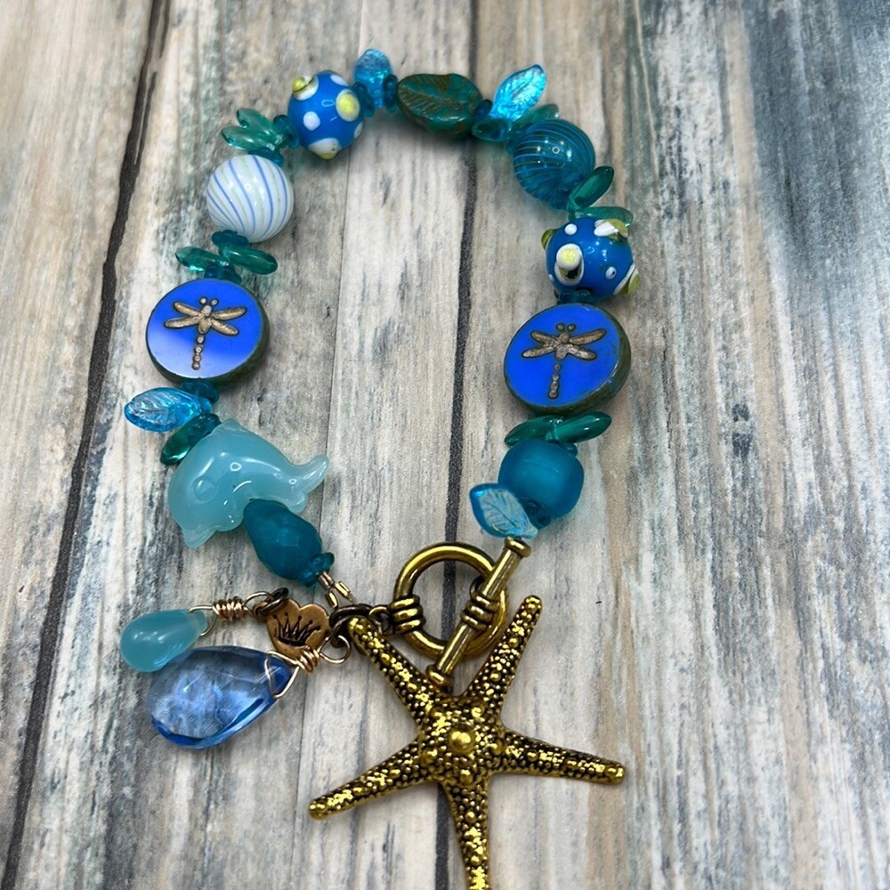 Adorned Crown Assemblage beaches & butterflies dragonfly starfish bracelet