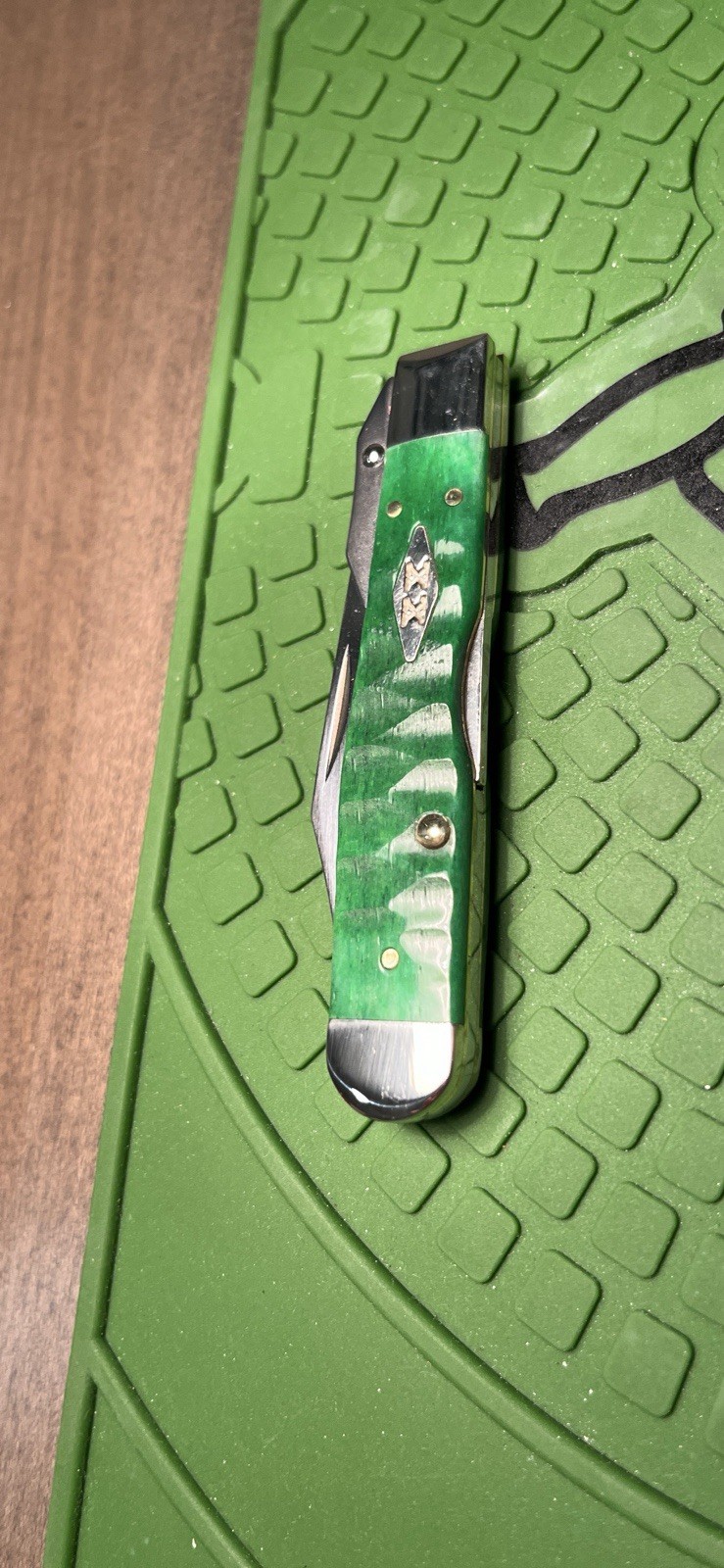 Case XX Bright Green Bone Gator Jig Cheetah Cub