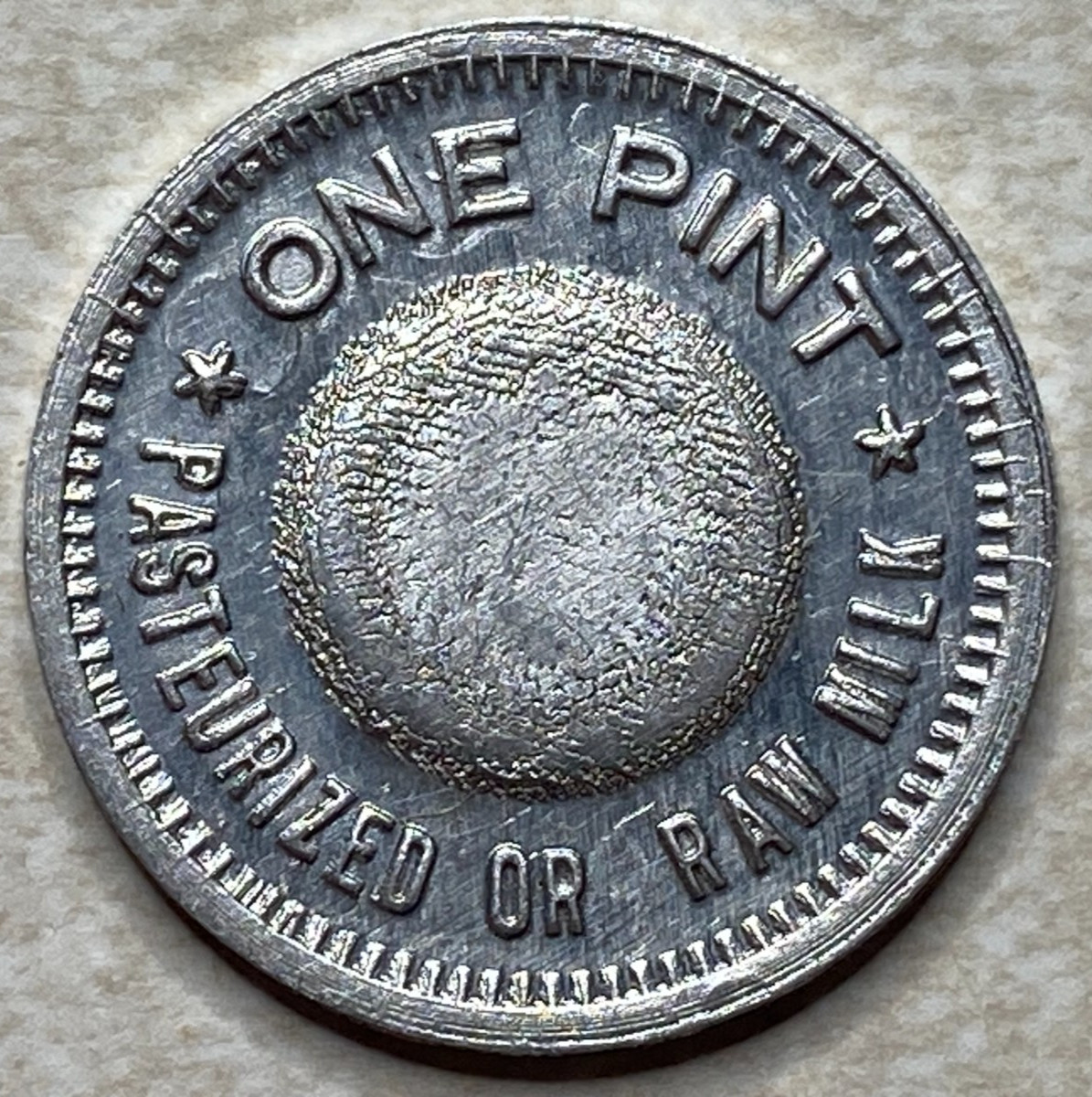 T9152 One Pint Pasteurized or Raw Milk, Unknown  Anillo Restrike Arcade Token
