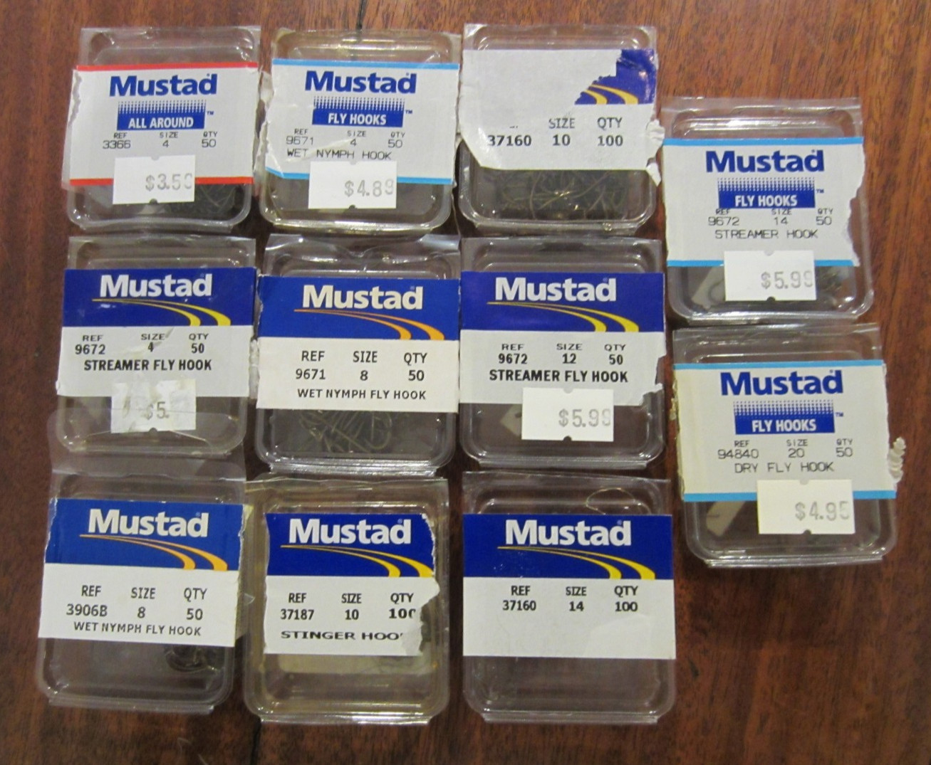 Mustad fly fishing hooks sizes #4,#8,#10,#12, #14,#20-4 boxes $15,all 11  for$36