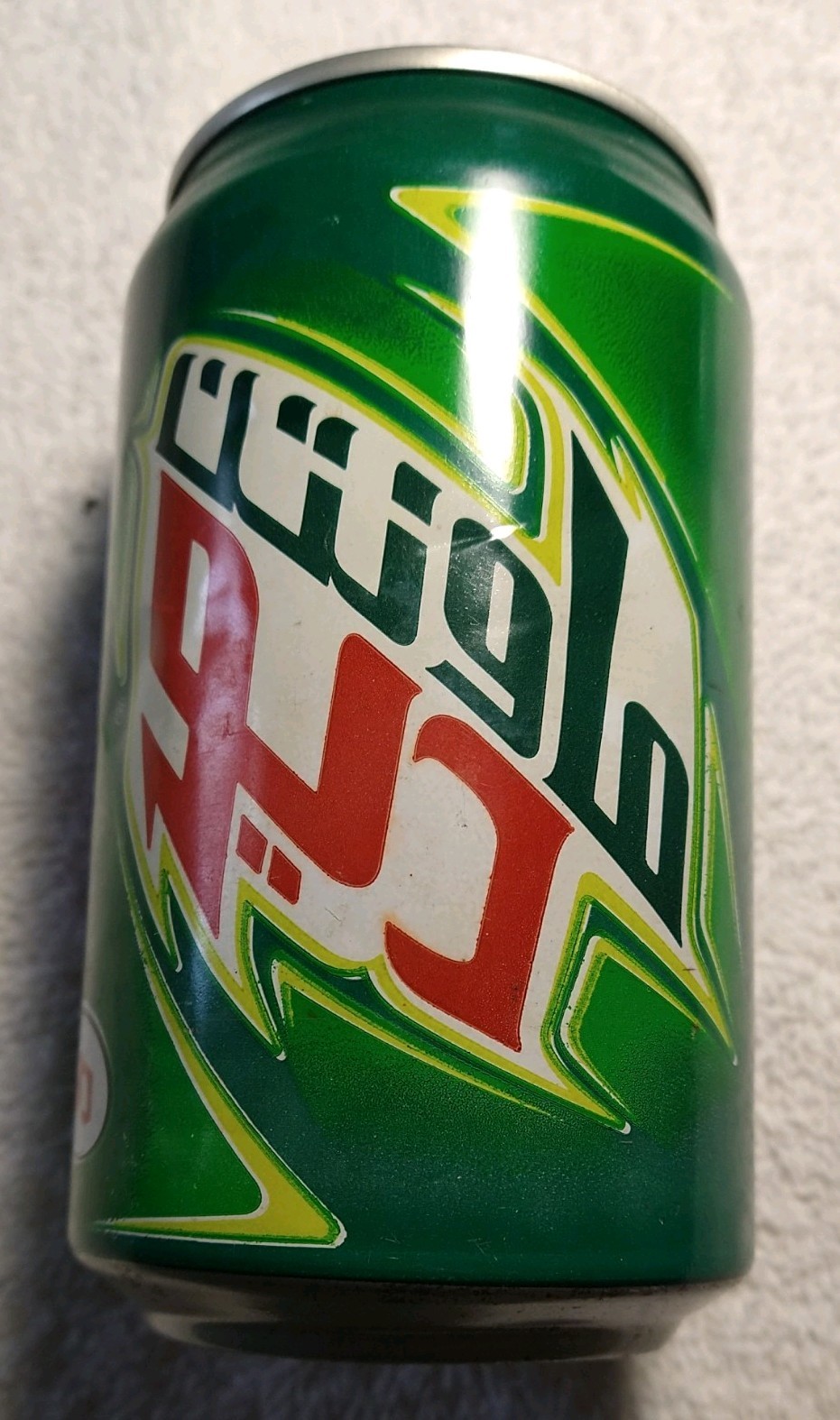 Mountain Dew Green Advertising Can Collectible International Arabic Text Empty