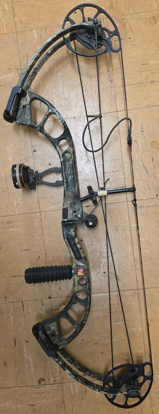 PSE x-force pro series Compound Bow with sight and stabilizer.