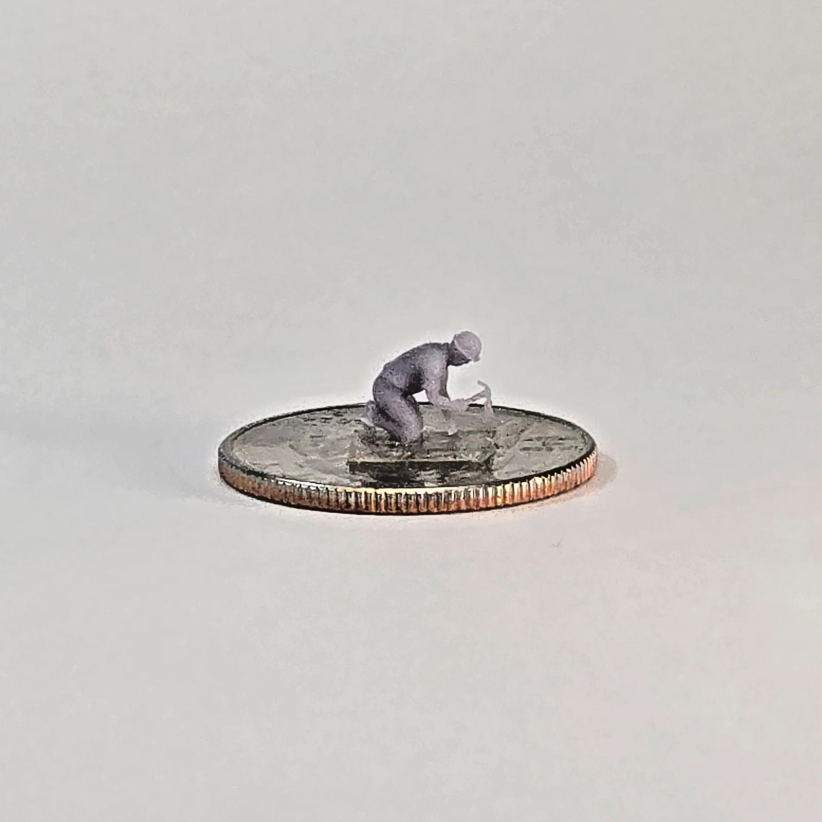 N Scale Carpenter Miniature – Kneeling Worker with Hammer | Unpainted Resin Figu