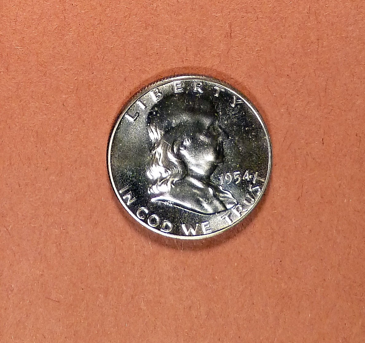 1954 Franklin Half Dollar grades CH Proof, Light Toning. Looks Nicer than Photo.