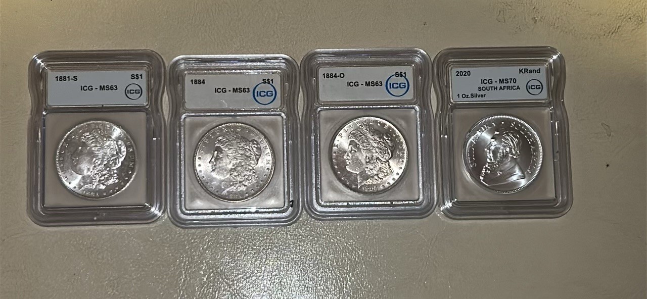1881-S 1884 1884 -O South African Kruggerand MS 70  Graded ICG Morgan Dollars