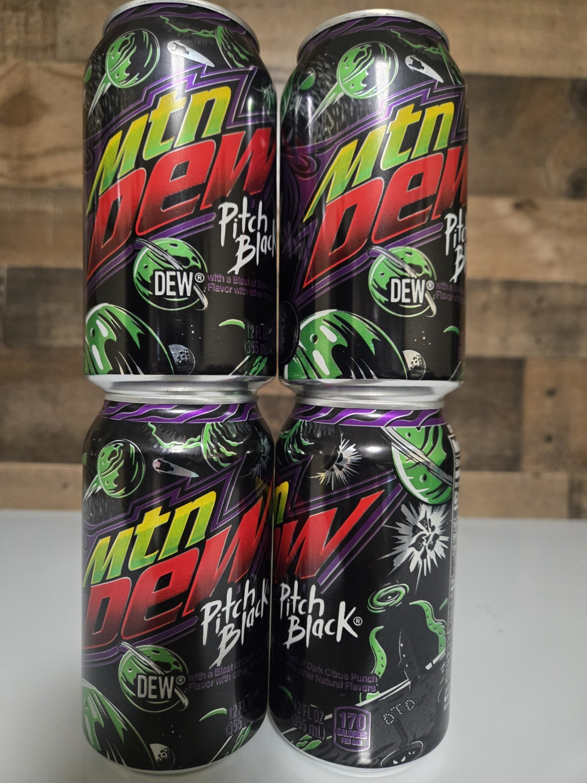 4 Brand New 12 Oz Cans of Pitch Black Mountain Dew Unopened