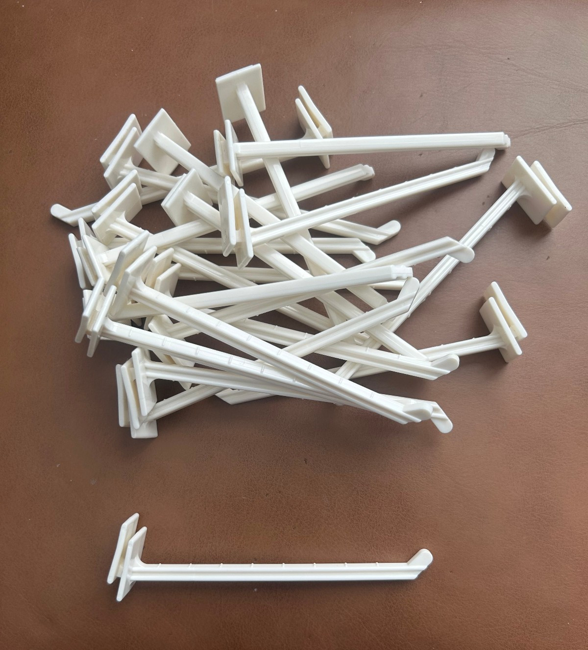 Lot Of 17  5 Inch Long - White - Plastic - Corrugated Display Hooks