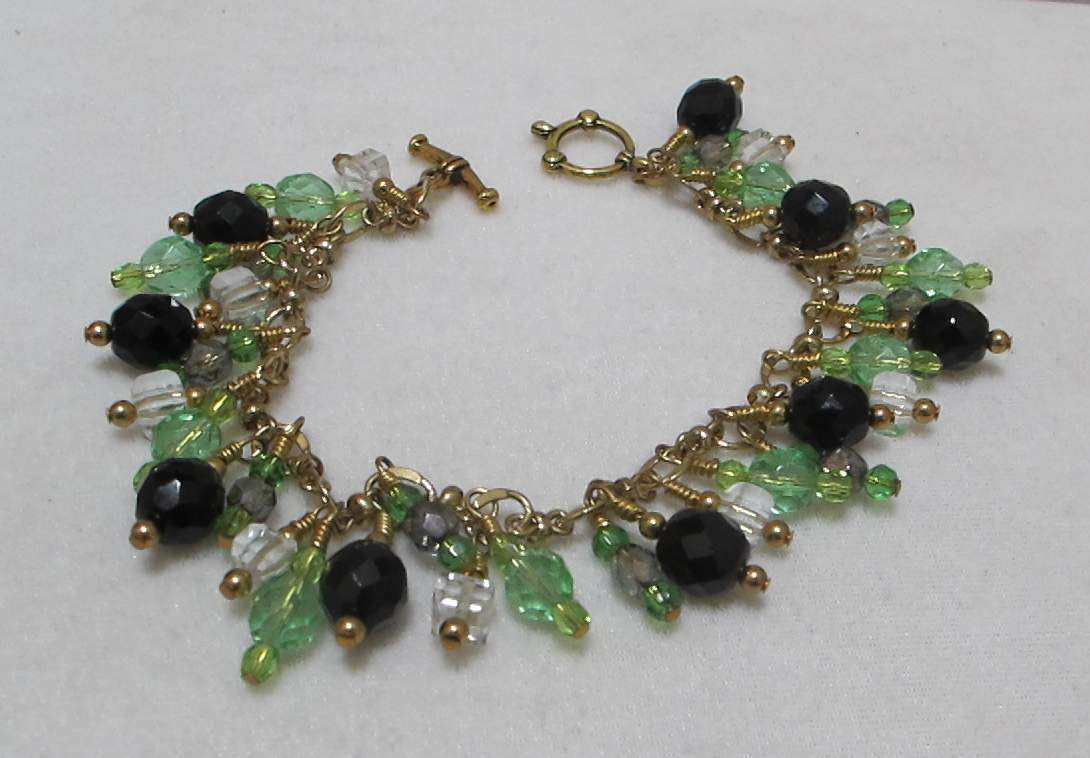 Artisan 9” Gold Tone Charm Bracelet Lt Green, Black, Clear Dangling Crystals