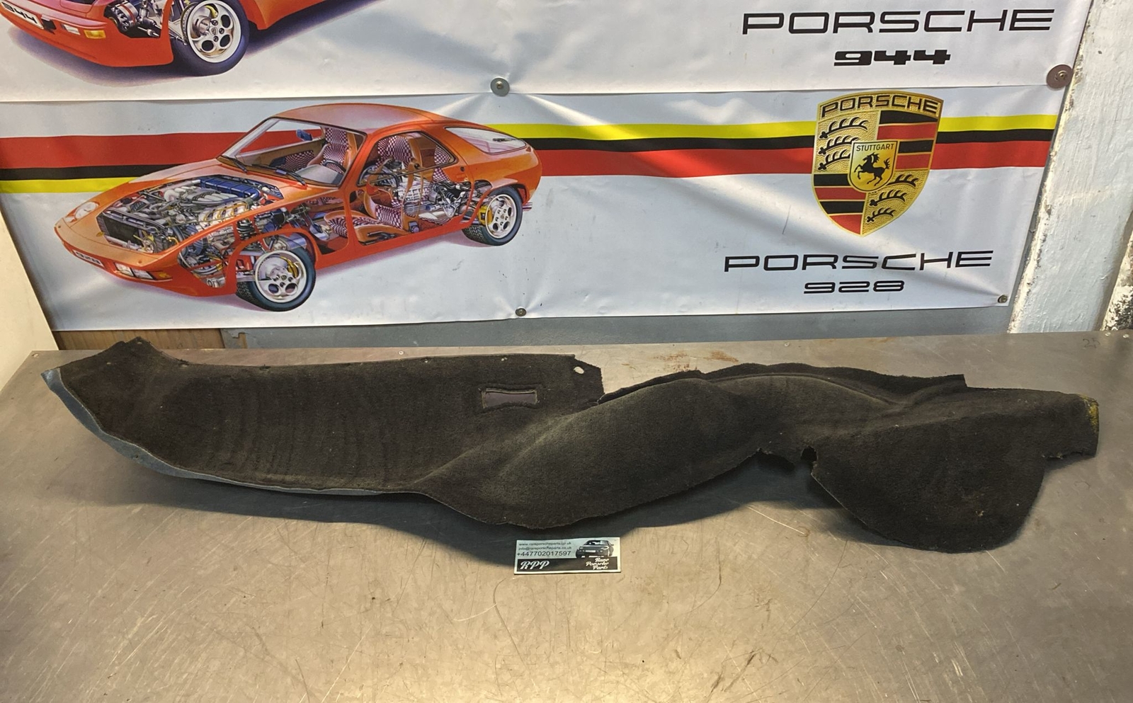 Porsche 924/944 85.5- rear left side trim carpet, black, 94455508302, used