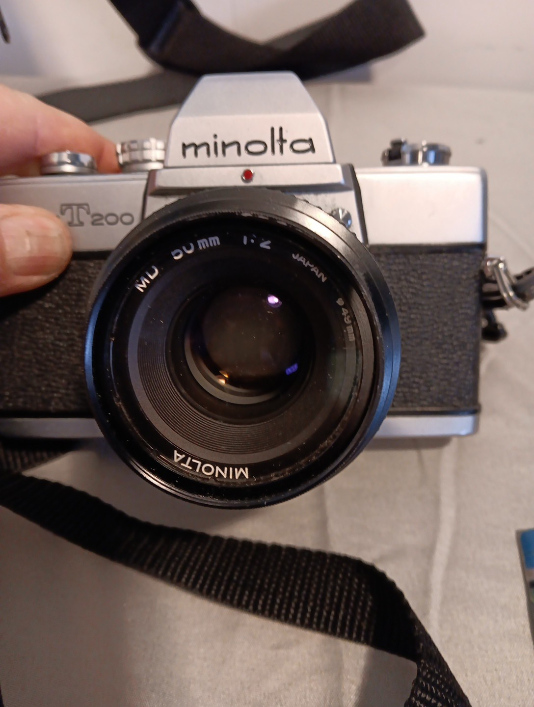 Minolta SRT 200 camera. With Accessories And Paperwork. Untested.