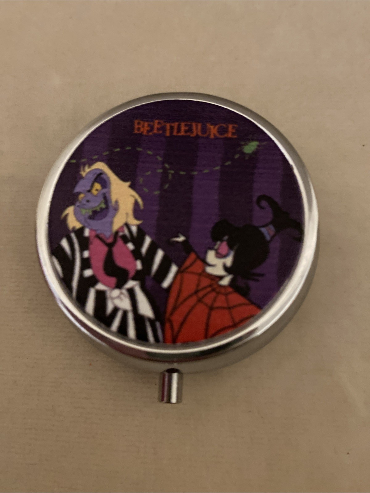Beetlejuice  And Lydia pill holder