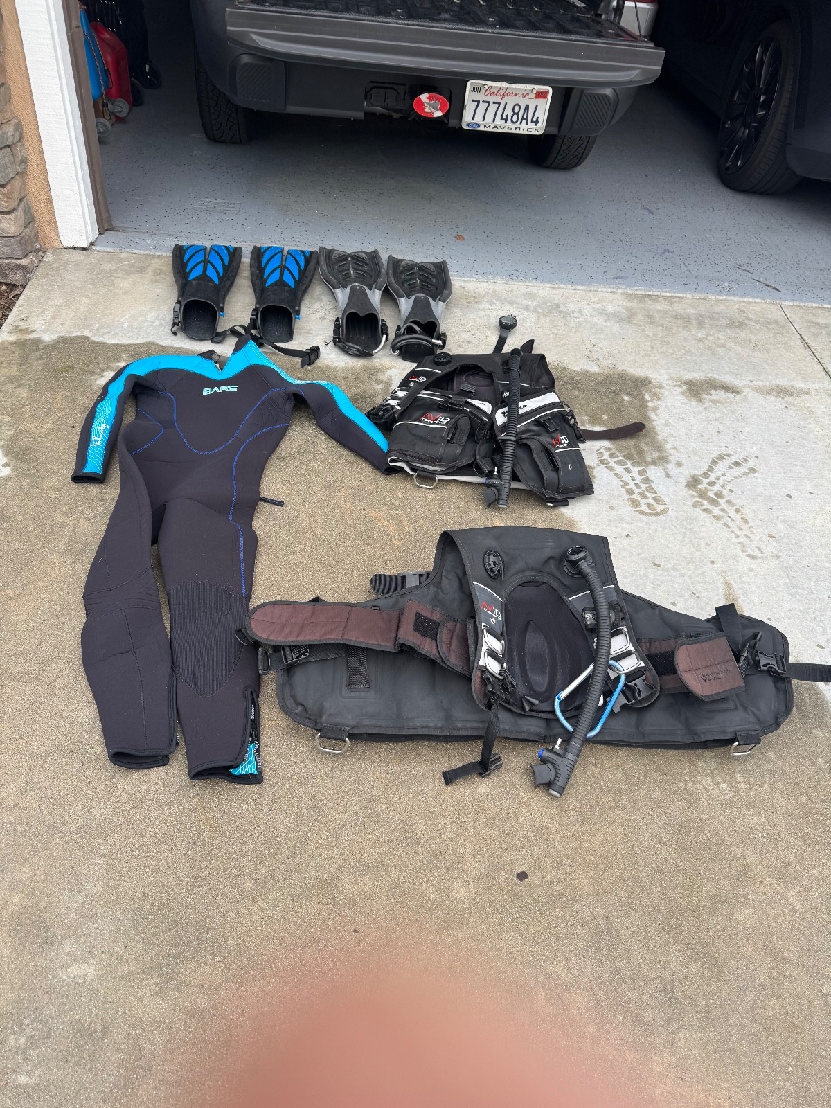 scuba diving equipment set. BCDs and wetsuit