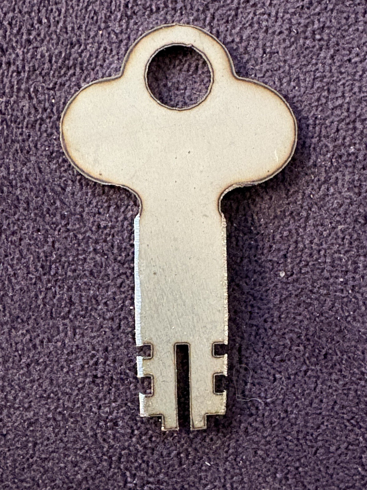Key for a vintage The Automatic Recording Safe Company "Traveling Teller" bank