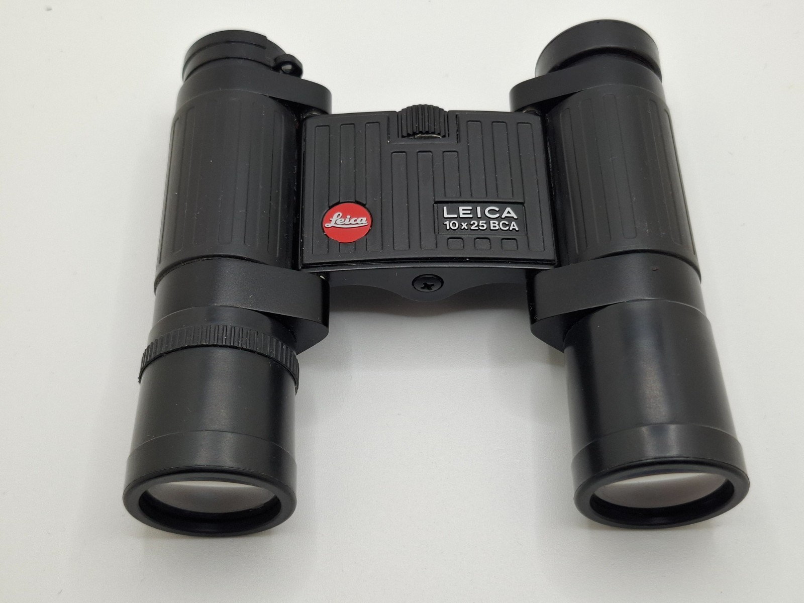 LEICA TRINOVID 10x25 BCA USED. NEED ONE Eye Piece Cup Pad SEE PIC AND VIDEO
