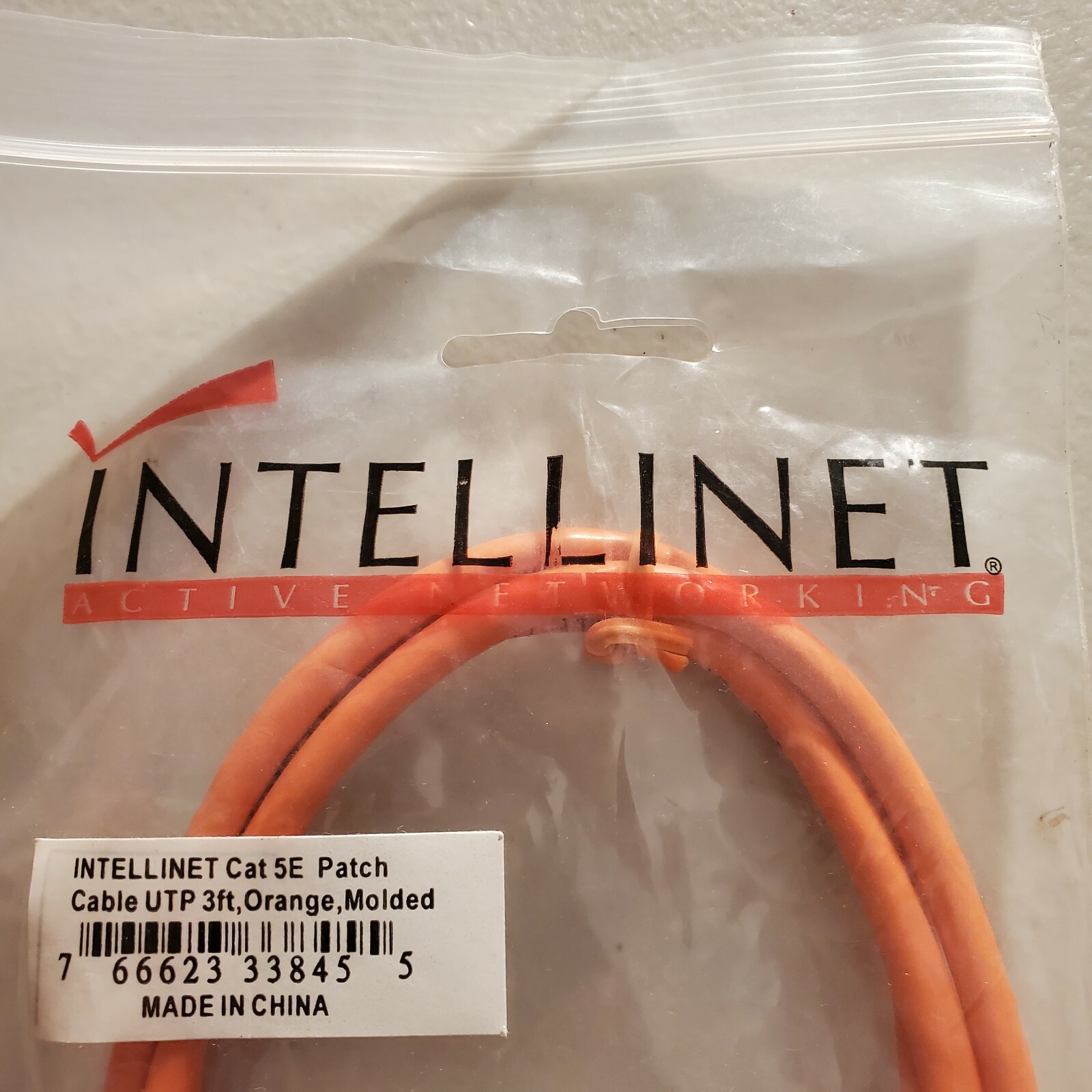 Intellinet Network Solutions Cat5e UTP Network Patch Cable, 3 ft (1.0 m), Orange