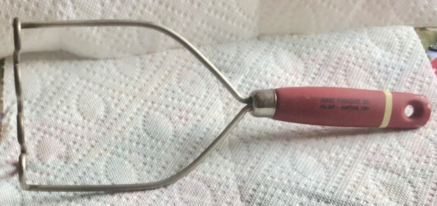 Vintage  Hampton Iowa Evans Furniture potato masher